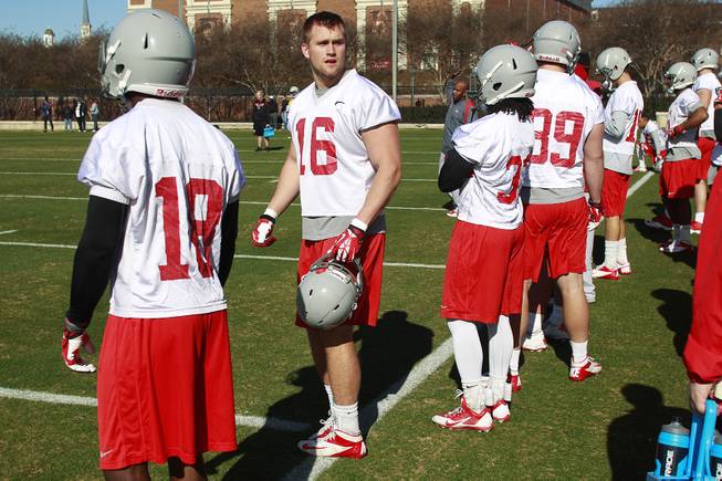UNLV tight end Taylor Barnhill talks to teammates during UNLV's practice on the campus of Southern Methodist University for the Heart of Dallas Bowl Monday, Dec. 30, 2013 in Dallas.