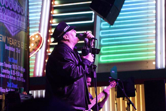 Blues Traveler performs during New Years Eve festivities at the Fremont Street Experience in downtown Las Vegas Tuesday, Dec. 31, 2013. An estimated 335,000 tourists were expected to visit Las Vegas to celebrate the new year.