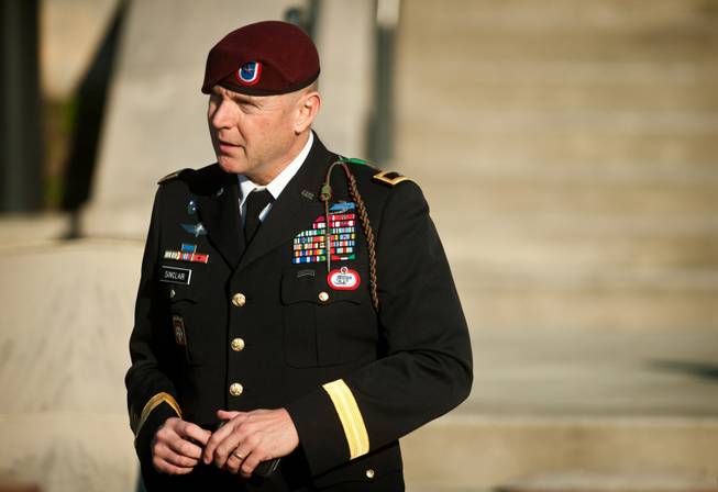 In this Tuesday, Jan. 22, 2013, file photo, Army Brig. Gen. Jeffrey A. Sinclair leaves a Fort Bragg, N.C., courthouse after he deferred entering a plea at his arraignment on charges of fraud, forcible sodomy, coercion and inappropriate relationships.