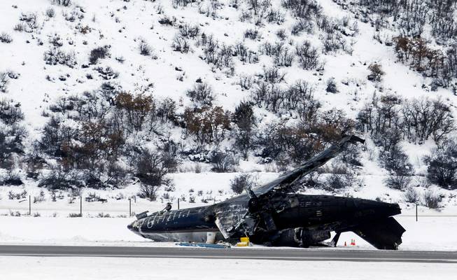 Colorado authorities say a fiery plane crash at the Aspen airport Sunday Jan. 5, 2014, killed one person and injured two others, one severely. Officials say the flight originated in Mexico and all three aboard were pilots and Mexican men.