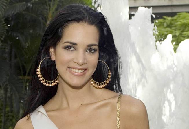 This May 23, 2005, file photo released by Miss Universe shows Monica Spear, Miss Venezuela 2005, posing for a portrait ahead of the Miss Universe competition in Bangkok, Thailand.
