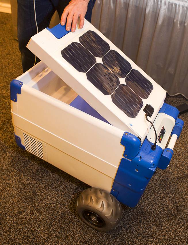 A Solar-Cooler, the worlds first portable, solar-powered refrigerated cooler, is displayed during the 2014 International Consumer Electronics Show (CES) in Las Vegas, Jan. 8, 2014. The cooler retails for $1,200 and includes USB and 12 volt outlets.