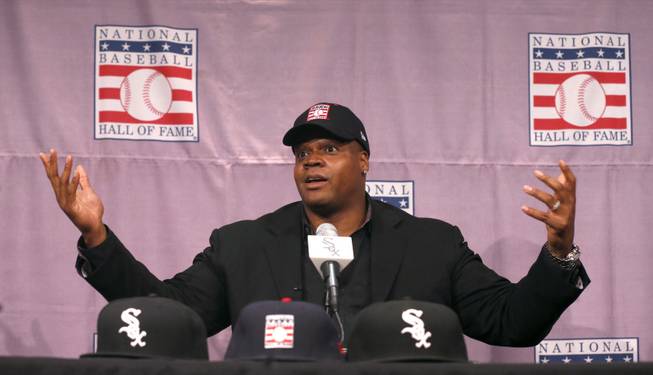Chicago White Sox slugger Frank Thomas gestures during a news conference about his selection into the MLB Baseball Hall Of Fame Wednesday, Jan. 8, 2014, at U.S. Cellular Field in Chicago. Thomas joins Greg Maddux and Tom Glavine as first ballot inductees Wednesday, and will be inducted in Cooperstown on July 27 along with managers Bobby Cox, Joe Torre and Tony La Russa, elected last month by the expansion-era committee.