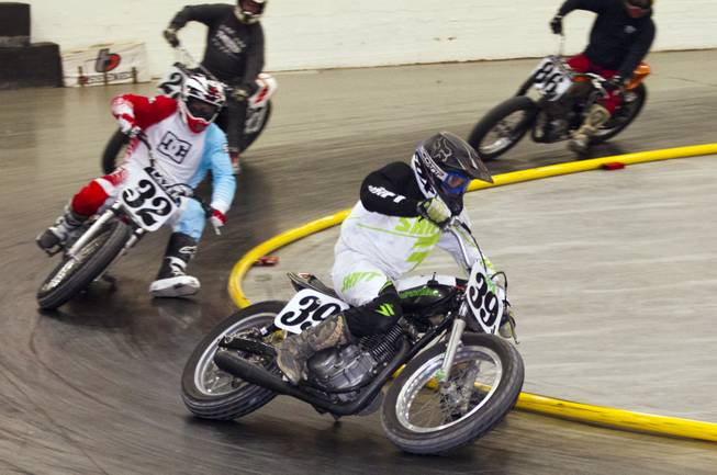 Rider Dale Hansen (39J) races to victory in the Vintage Class during the West Coast Flat Track Series Races at South Point on Friday, Jan. 10, 2014.