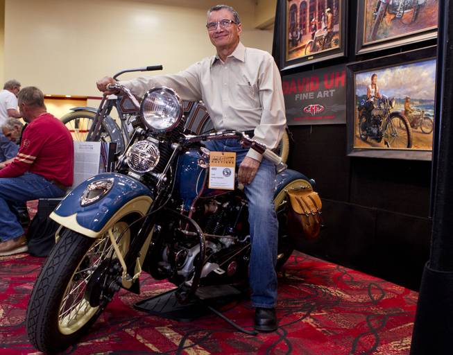 George Pardos with one of his favorite bikes in his collection, Evolution of the Harley-Davidson Motorcycle, showcasing 20 historic first-year Harley-Davidson motorcycles from 1911-1965 up for auction at South Point on Friday, Jan. 10, 2014.