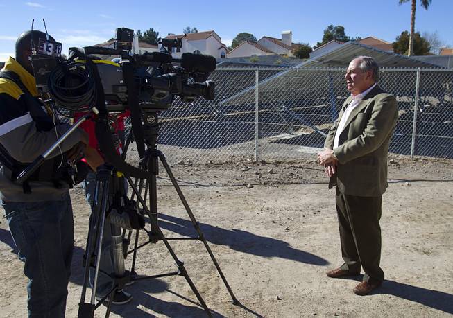 Frank Gordon, project coordinator, speaks to television reporters following a news conference to "unveil" a solar photovoltaic field at Congregation Ner Tamid in Henderson Sunday, Jan. 12, 2014. The $1.6 million project, a partnership of Congregation Ner Tamid, NV Energy and Hamilton Solar, will produce about 75 percent of the temple's power usage on average, said Matthew Weinberger, Hamilton Solar's director of business development.