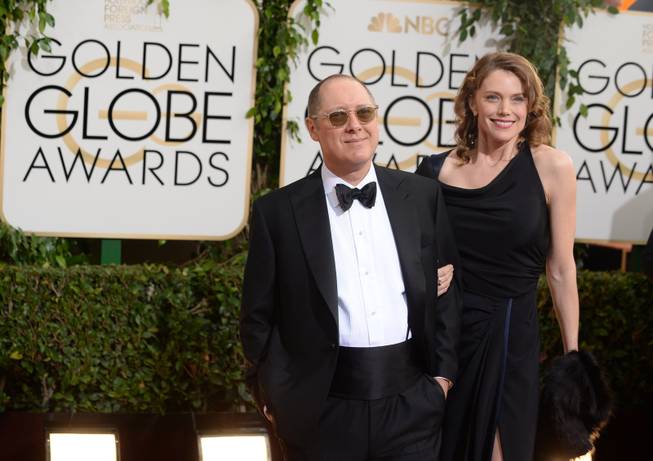 From left, James Spader and Leslie Stefanson arrive at the 71st annual Golden Globe Awards at the Beverly Hilton Hotel on Sunday, Jan. 12, 2014, in Beverly Hills, Calif. 