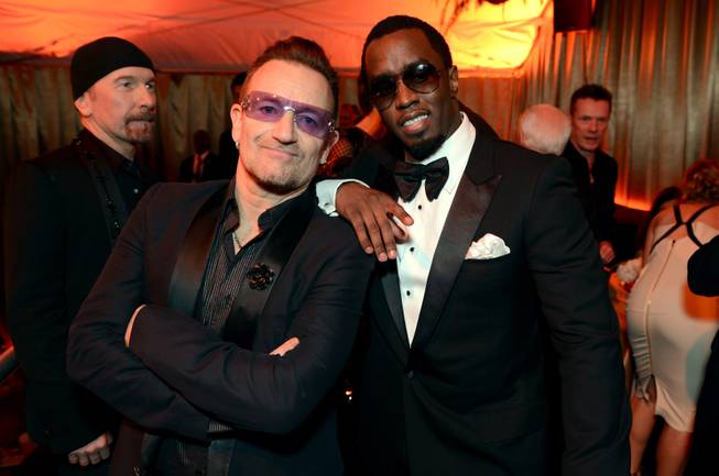 Bono, left, and Sean Combs The Weinstein Company's Golden Globes after party at the Beverly Hilton Hotel on Sunday, Jan. 12, 2014, in Beverly Hills, Calif. 