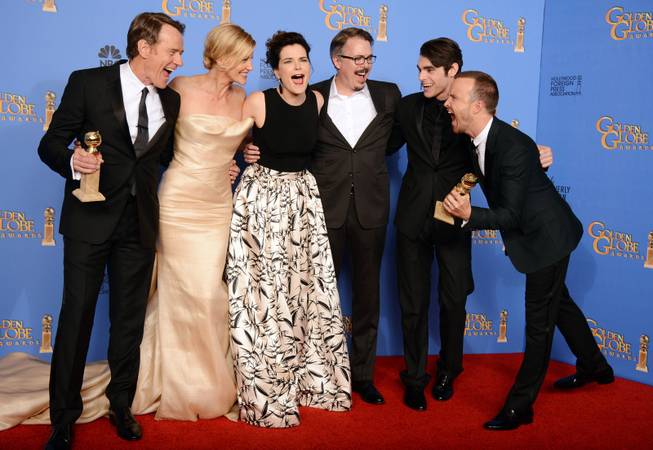 From left, Bryan Cranston, Anna Gunn, Betsy Brandt, Vince Gilligan, RJ Mitte, and Aaron Paul pose in the press room with the award for Best TV Series — Drama for "Breaking Bad" at the 71st annual Golden Globe Awards at the Beverly Hilton Hotel on Sunday, Jan. 12, 2014, in Beverly Hills, Calif. 