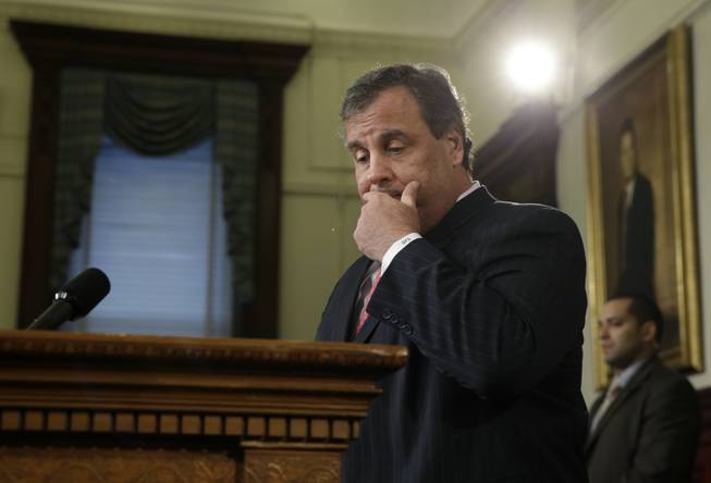 New Jersey Gov. Chris Christie pauses as he addresses the media during a news conference Thursday, Jan. 9, 2014, at the Statehouse in Trenton.