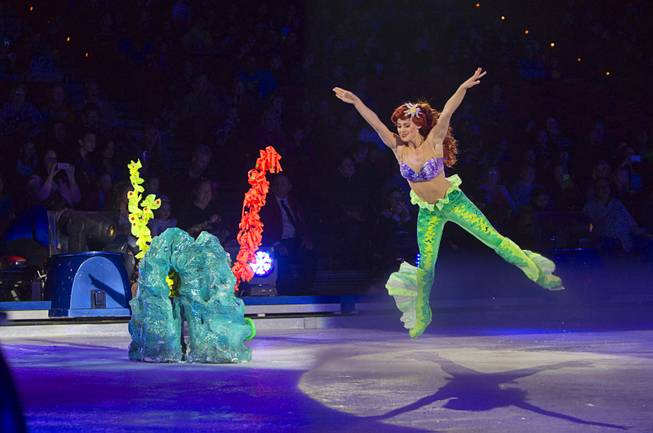 Ariel from "The Little Mermaid" jumps during "Disney On Ice: Rockin' Ever After" at the Thomas & Mack Center Thursday, Jan. 16, 2014. The show plays at the center through Sunday.