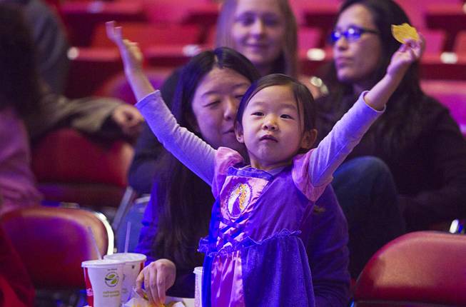 Isabelle Kim, 5, waits for the start of "Disney On Ice: Rockin' Ever After" at the Thomas & Mack Center Thursday, Jan. 16, 2014. The show plays at the center through Sunday.