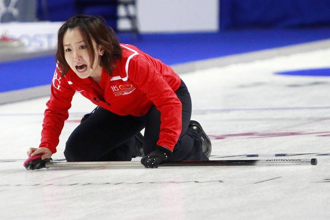 Satsuki Fujisawa yells instructions to her sweepers during the first day of the 2014 World Financial Group Continental Cup of Curling at the Orleans Arena Thursday, Jan. 16, 2014. Of the twelve teams competing from around the world, nine of them will represent their respective country at the upcoming Olympics in Sochi, Russia.