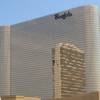 In this June 26, 2013, photo, the Borgata Hotel Casino & Spa is seen in Atlantic City, N.J., with the nearby Water Club reflected in its gold glass facade.