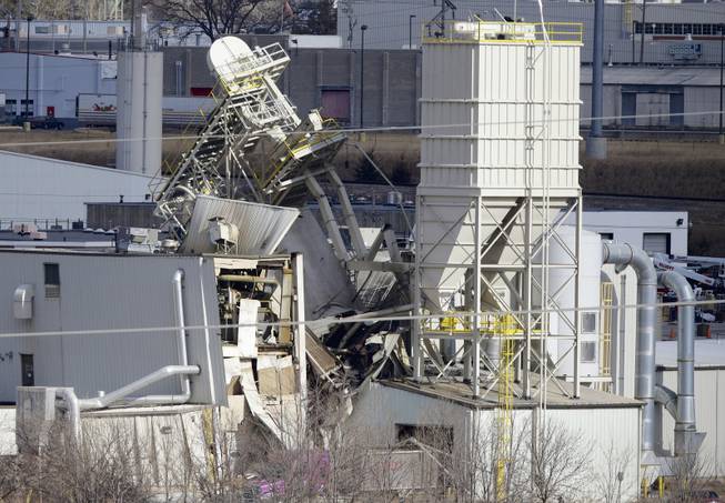 The International Nutrition plant is shown with wreckage in Omaha, Neb., where a fire and explosion took place Monday, Jan. 20, 2014.