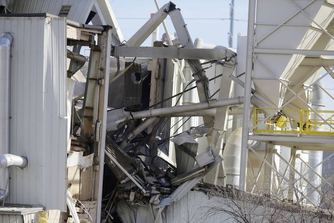 The International Nutrition plant is in wreckage  in Omaha, Neb., where a fire and explosion took place Monday, Jan. 20, 2014.