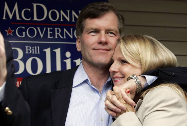 In this Oct. 31, 2009, file photo, Republican gubernatorial candidate Bob McDonnell, hugs his wife, Maureen, during a rally in Richmond, Va. McDonnell and his wife were indicted Tuesday, Jan. 21, 2014, on corruption charges after a  federal investigation into gifts the Republican received from a political donor.