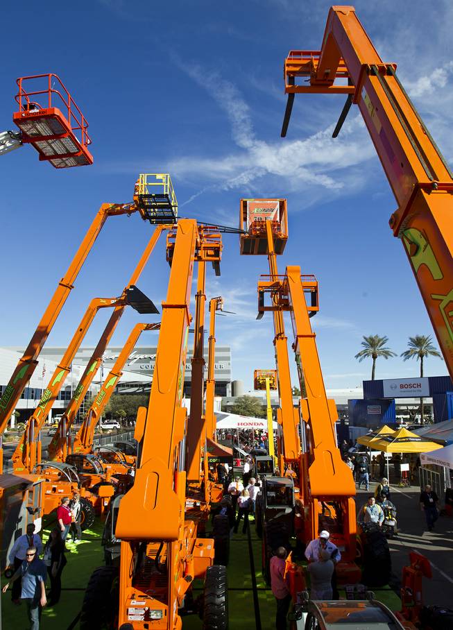 A collection of Snorkel Lifts are on display during the 40th anniversary of the World Of Concrete event outside the Las Vegas Convention Center on Wednesday, Jan. 22, 2014.