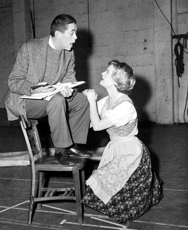 With an assist from director Vincent Donahue, star Florence Henderson rehearses a song for "The Sound of Music." Feb. 9, 1961. She heads the national company which will open a cross country tour Feb. 27, 1961 in Detroit. Accent in the New York rehearsals of the show has been on building the road show on its own, not copying the original except for costumes and scenery.
