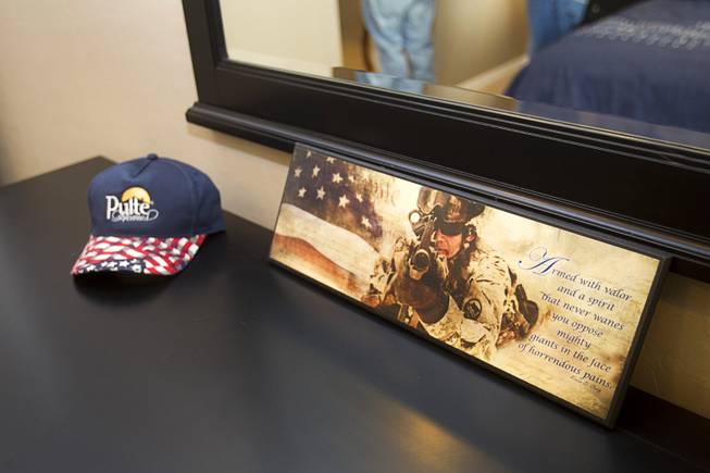 Patriotic decor is shown in a bedroom during a new home dedication for Army Sgt. Christopher Bales and his family at the Coldwater Crossing subdivision in the Mountain's Edge master planned community Thursday Jan. 23, 2014. Pulte Homes, along with other companies, presented the home to Bales as part of Operation Finally Home," an organization which provides homes to veterans and the families of fallen servicemen.