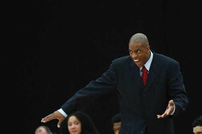 Findlay Prep coach Jerome Williams talks to his players during their game against Bishop Gorman Saturday, Jan. 25, 2014 at the South Point. Gorman won 76-72 in overtime.