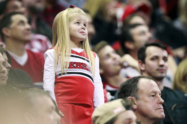 A young UNLV fan looks up at the scoreboard during their game against Fresno St. Saturday, Jan. 25, 2014 at the Thomas & Mack Center. UNLV won 75-73 in overtime.