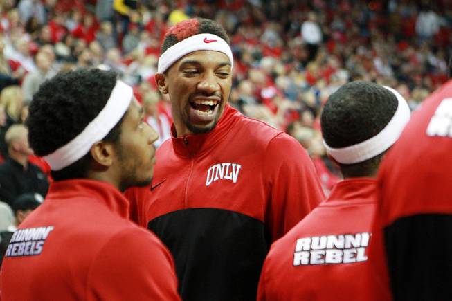 UNLV forward Khem Birch jokes with his teammates before their game against Fresno St. Saturday, Jan. 25, 2014 at the Thomas & Mack Center. UNLV won 75-73 in overtime.