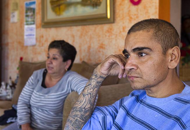 Francisco Diaz with his mother Adela Espana at an elderly care home in Mexicali, Mexico Sunday, Jan. 26, 2014. Diaz is staying at the home while he is recovering from an robbery and assault that put him in a coma for three weeks. Diaz was born in Mexico but grew up in Las Vegas with a green card.