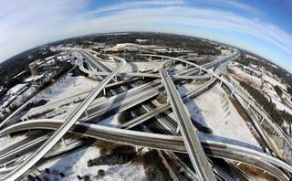In this photo taken with a fisheye lens over the city's perimeter highway known as 