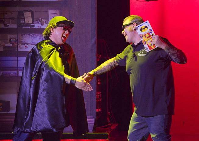 Chump (Garrett Grant), left, and Lil' Boss (Gus Langley), meet for the first time during "Pawn Shop Live!" at the Golden Nugget Thursday, Jan. 30, 2014. The production show is a parody based on the story of Gold & Silver Pawn, home of the History Channel's Pawn Stars television series.