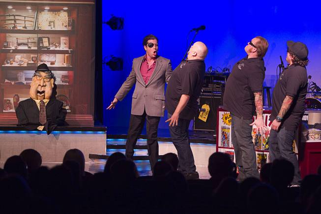 A Las Vegas city councilman (with eyepatch) pays a visit during "Pawn Shop Live!" at the Golden Nugget Thursday, Jan. 30, 2014. The production show is a parody based on the story of Gold & Silver Pawn, home of the History Channel's Pawn Stars television series.