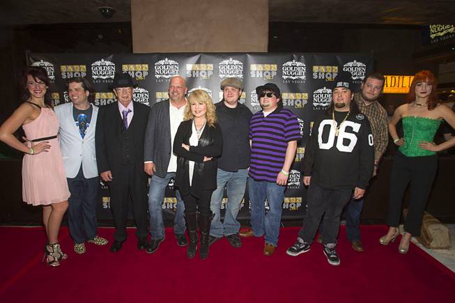Cast members of "Pawn Shop Live!", members of Pawn Stars, and guests, including Pia Zadora, center, pose on the red carpet after attending a performance of "Pawn Shop Live!" at the Golden Nugget Thursday, Jan. 30, 2014. The production show is a parody based on the story of Gold & Silver Pawn, home of the History Channel's Pawn Stars television series.