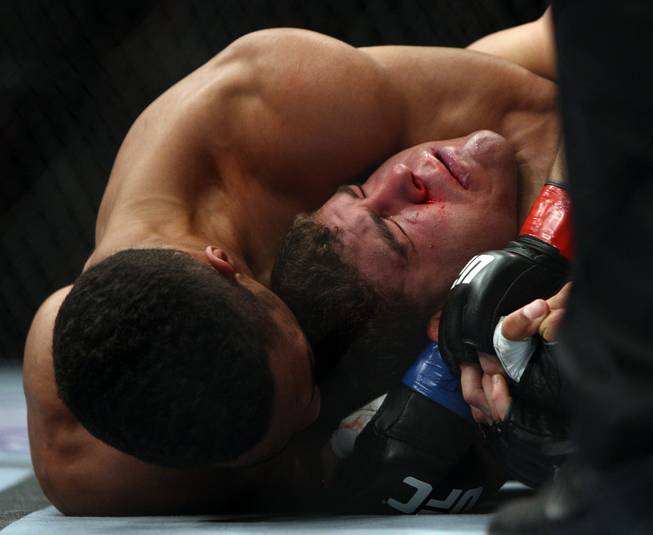 Al Iaquinta, right, and Kevin Lee fight during the second round of a UFC 169 lightweight mixed martial arts bout in Newark, N.J., Saturday, Feb. 1, 2014. Iaquinta won by unanimous decision.
