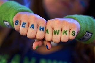 Seahawks fan Stefanie Wittren of Seattle shows her spirit at Scooters Pub, 6200 S. Rainbow Blvd., Sunday, Feb. 2, 2014.