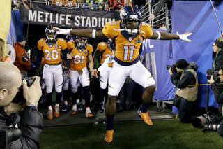 Denver Broncos' Trindon Holliday and takes the field before the NFL Super Bowl XLVIII football game against the Seattle Seahawks Sunday, Feb. 2, 2014, in East Rutherford, N.J. (AP Photo/Mark Humphrey)