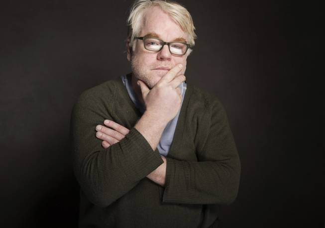 In this Sunday, Jan. 19, 2014, photo, Philip Seymour Hoffman is at The Collective and Gibson Lounge Powered by CEG during the Sundance Film Festival in Park City, Utah. Hoffman was found dead Sunday, Feb. 2, 2014, in his New York apartment. He was 46. 