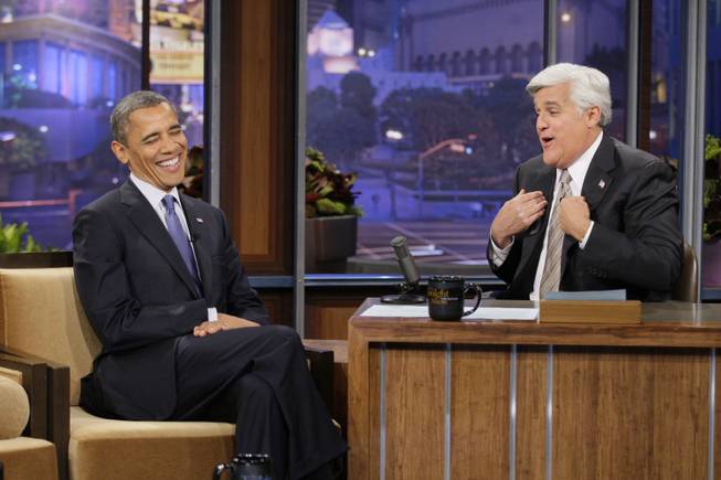 This Oct. 12, 2012, photo released by NBC shows President Barack Obama during an interview with host Jay Leno on "The Tonight Show with Jay Leno," in Burbank, Calif. After 22 years, Leno will host his last show on Thursday, Feb. 6, 2014.