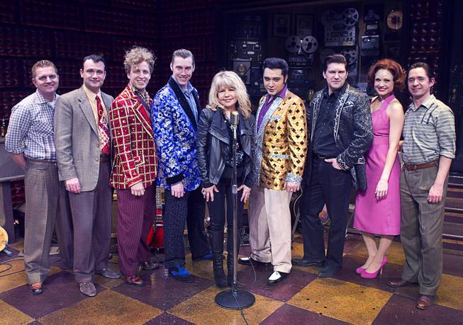 Singer/actress Pia Zadora, center, poses with cast members following a guest performance in "Million Dollar Quartet" at Harrah's Tuesday, Feb. 4, 2014.