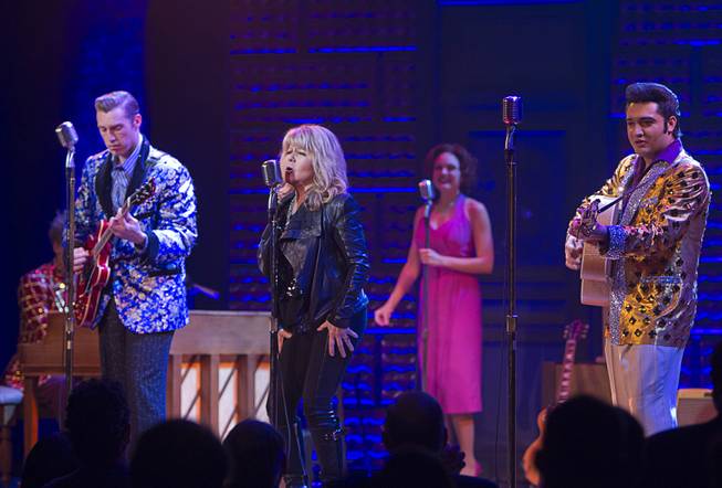 Singer/actress Pia Zadora performs during a guest performance in "Million Dollar Quartet" at Harrah's Tuesday, Feb. 4, 2014. With Zadora are Scott Hinds, left, Felice Garcia, and Justin Shandor.