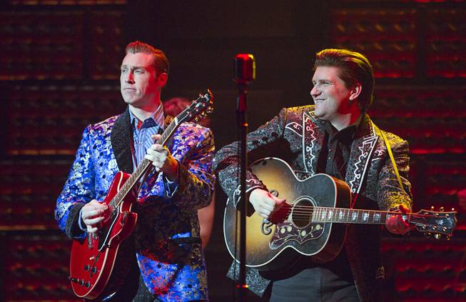 Scott Hinds as Carl Perkins and Benjamin Hale as Johnny Cash perform in "Million Dollar Quartet" at Harrah's Tuesday, Feb. 4, 2014.