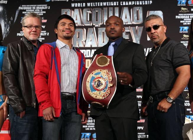 Feb.  4, 2014, Beverly Hills ,Ca.   ---  (center L-R)  Manny Pacquiao and undefeated WBO World Welterweight  champion Timothy Bradley  pose  with their trainers : (L-R) Freddie Roach and Joel Diaz during the press conference  in Beverly Hills to announce their upcoming rematch during a two-city media tour in Los Angeles on Tuesday and New York on Thursday.  Pacquiao vs. Bradley 2 will take place, Saturday, April 12 at the MGM Grand Garden Arena in Las Vegas. Chris Farina - Top Rank