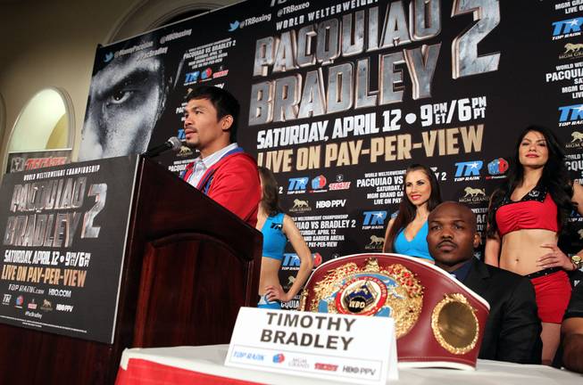 Feb.  4, 2014, Beverly Hills ,Ca.   ---  Manny Pacquiao (L) and undefeated WBO World Welterweight  champion Timothy Bradley(R) attend the press conference  in Beverly Hills to announce their upcoming rematch during a two-city media tour in Los Angeles on Tuesday and New York on Thursday.  Pacquiao vs. Bradley 2 will take place, Saturday, April 12 at the MGM Grand Garden Arena in Las Vegas. Chris Farina - Top Rank