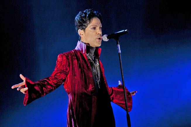 Musician Prince performs at the Sziget Festival on the Shipyard Island, northern Budapest, Hungary, Aug. 9, 2011. The enigmatic star flew into London on Feb. 4, 2014, at the start of a still-evolving string of dates in support of forthcoming album "Plectrum Electrum."