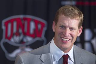 UNLV head football coach Bobby Hauck talks about new recruits during a news conference at UNLV Wednesday, Feb. 5, 2014.