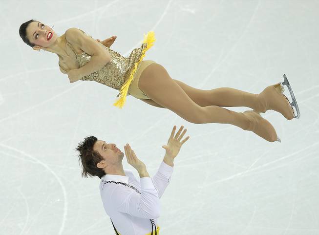 Stefania Berton and Ondrej Hotarek of Italy compete in the team pairs short program figure skating competition at the Iceberg Skating Palace during the 2014 Winter Olympics, Thursday, Feb. 6, 2014, in Sochi, Russia.