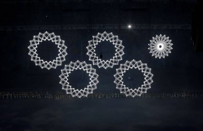 One of the Olympic rings fails to open during the opening ceremony of the 2014 Winter Olympics in Sochi, Russia, Friday, Feb. 7, 2014.