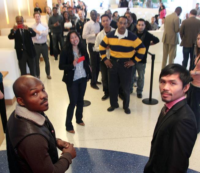Feb. 7, 2014, Philadelphia, Pa.   ---  (L-R) Undefeated WBO World Welterweight  champion Timothy Bradley and Manny Pacquiao make a special meet 'n greet appearance at Comcast global headquarters in downtown Philadelphia,Pa. on the final stop of their media tour. The boxers are in town to promote their upcoming rematch on Saturday, April 12 at the MGM Grand Garden Arena in Las Vegas. Chris Farina - Top Rank
