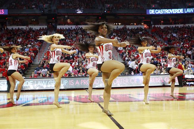 The UNLV dance team perform during  time out in their game against Wyoming Saturday, Feb. 8, 2014 at the Thomas & Mack Center. UNLV won 48-46.