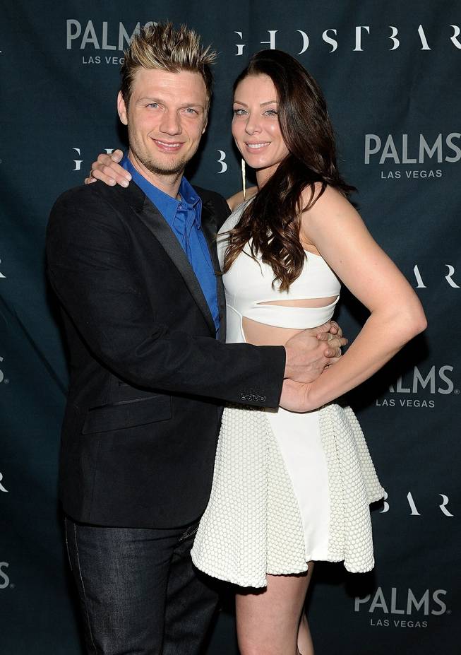 Nick Carter and Lauren Kitt arrive at their joint bachelor and bachelorette parties at Ghostbar on Saturday, Feb. 8, 2014, in the Palms.