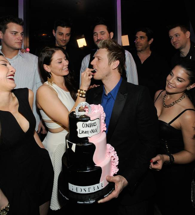 Singer Nick Carter of The Backstreet Boys and his fiancee Lauren Kitt celebrate their joint bachelor and bachelorette parties at Ghostbar on Saturday, Feb. 8, 2014, in the Palms.